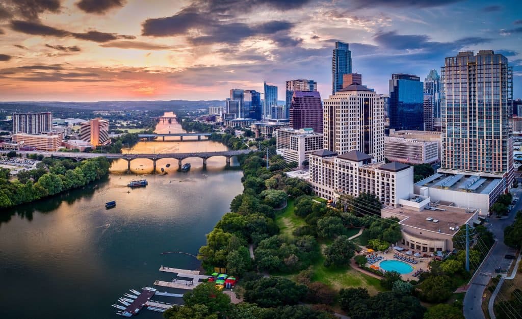 Austin, TX view with bridges over the river, symbolizing progress and infrastructure